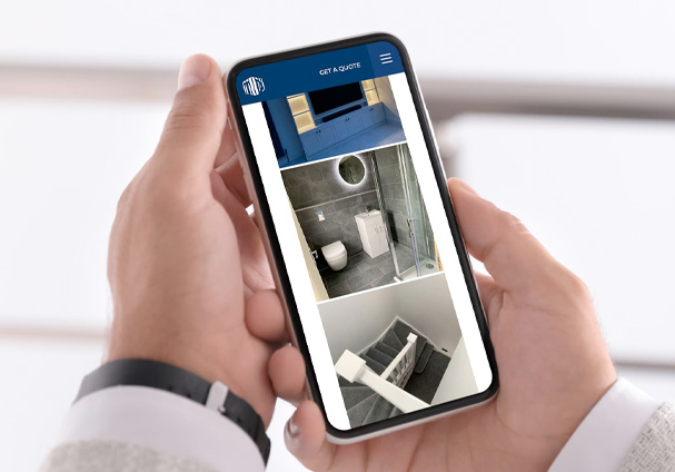 Bathroom renovation website with multiple interior design images showcasing modern bathroom fixtures and layouts